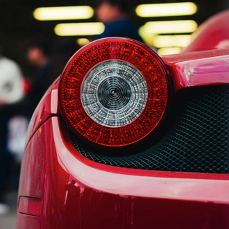 Close-up of a red Ferrari taillight